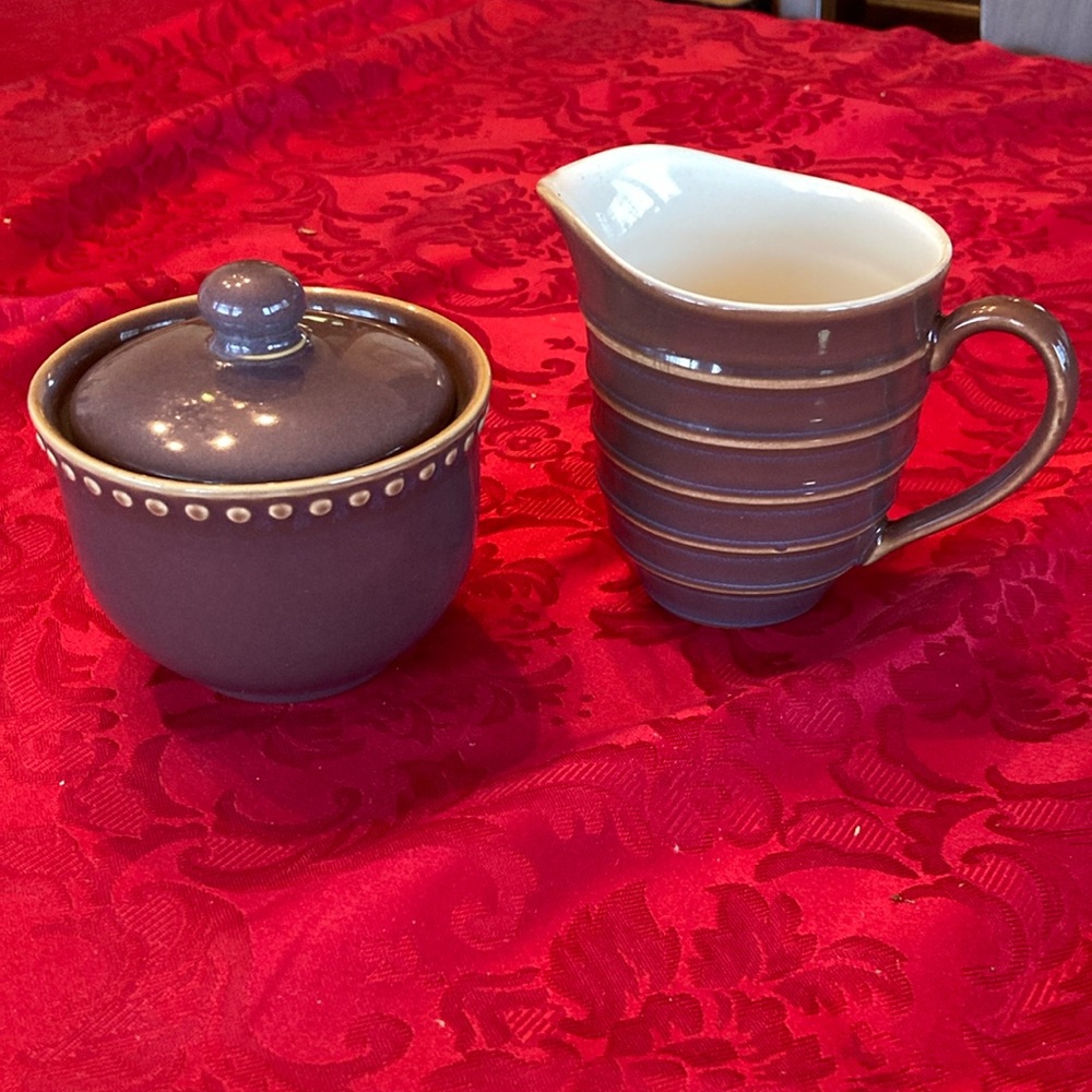 Dansk plum colored sugar bowl with lid and creamer.